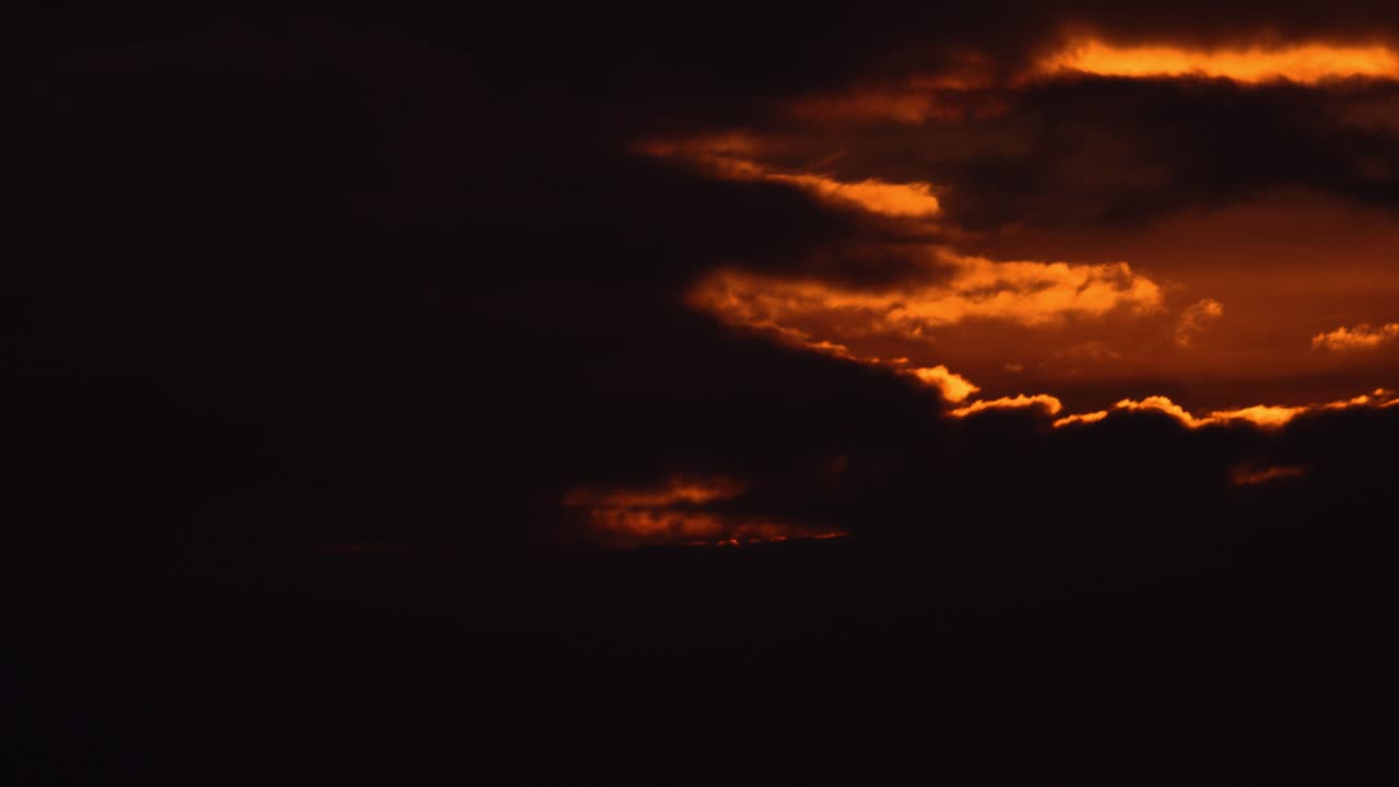 Timelapse during the last minute of sunset on telephoto lens.