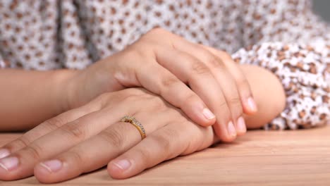 woman's hands with a ring