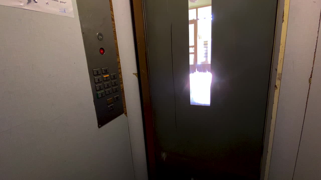 Going up a Tiny European Elevator with Exposed Doors to the Top Floor. POV