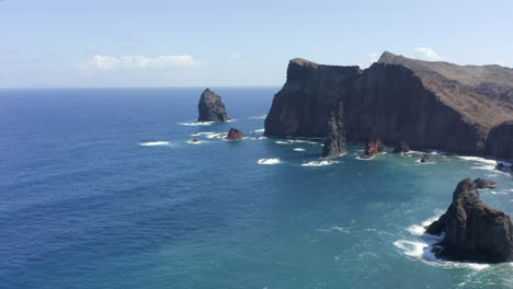 coastal rocks of ponta do rosto - landscape of madeira island, portugal - aerial drone shot