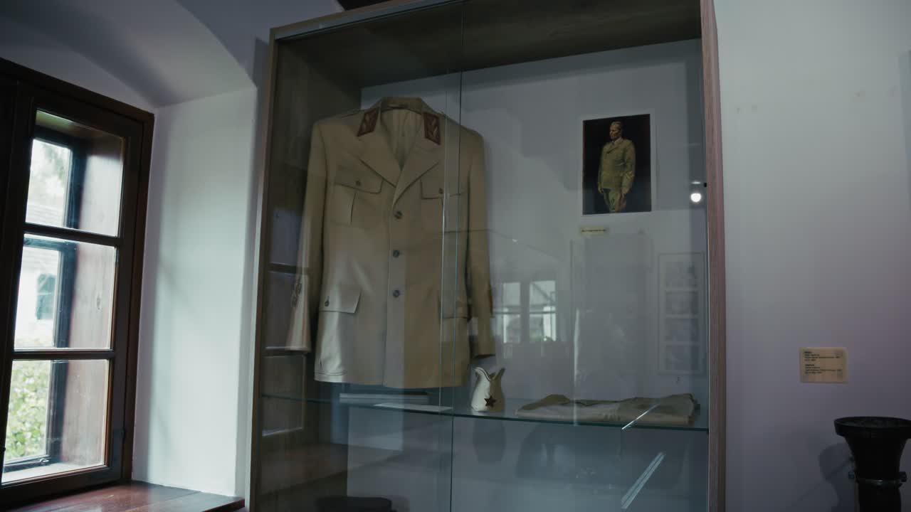 Military uniform of Josip Broz Tito displayed in a glass case in Kumrovec museum, Croatia