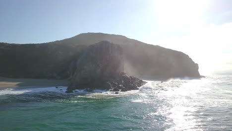 Beautiful-beach-withrocky-cliff-in-the-background