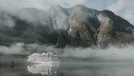 cruise ship in fjords of norway. dramatic time lapse video