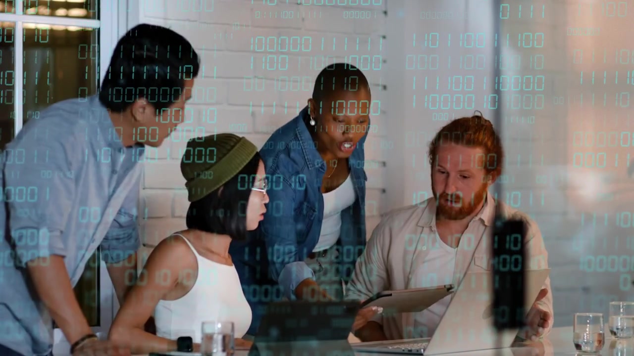 Pair sitting using devices arriving coworker showing tablet causing tech review with binary overlay