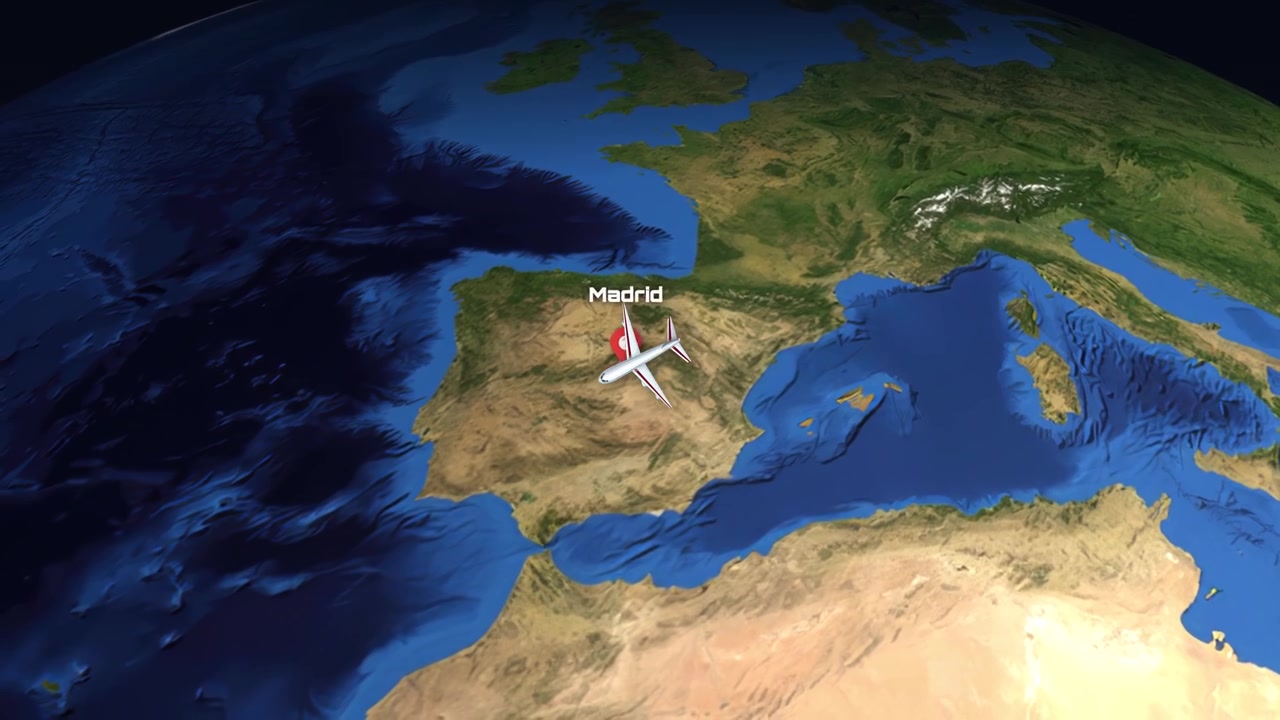 Satellite view animation follows a commercial airplane flying from Guangzhou, China to Madrid, Spain