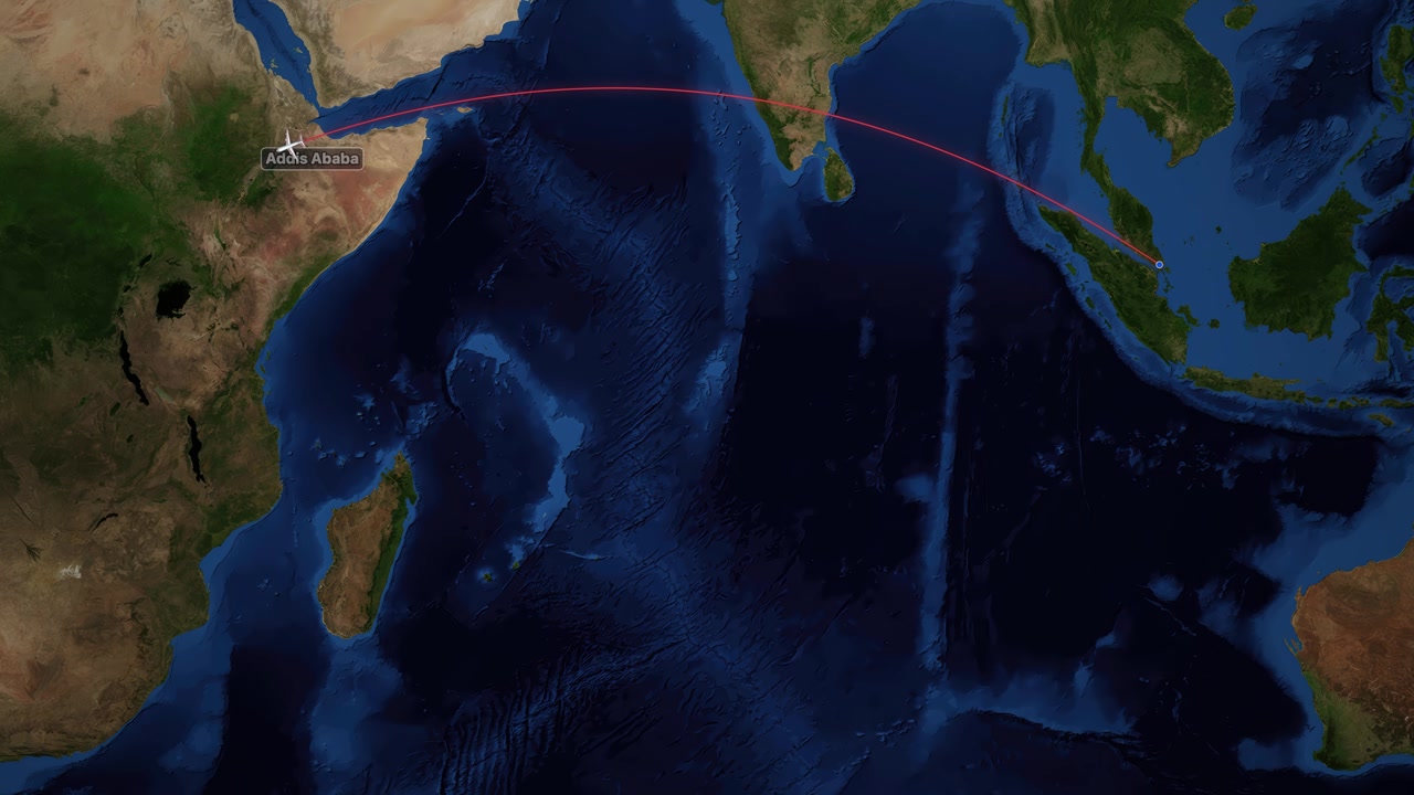 Satellite map animation shows a plane traveling from Singapore to Addis Ababa across the ocean