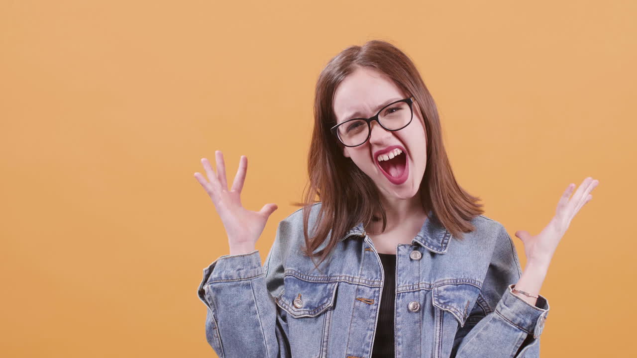 Teenage girl expressing frustration and anger