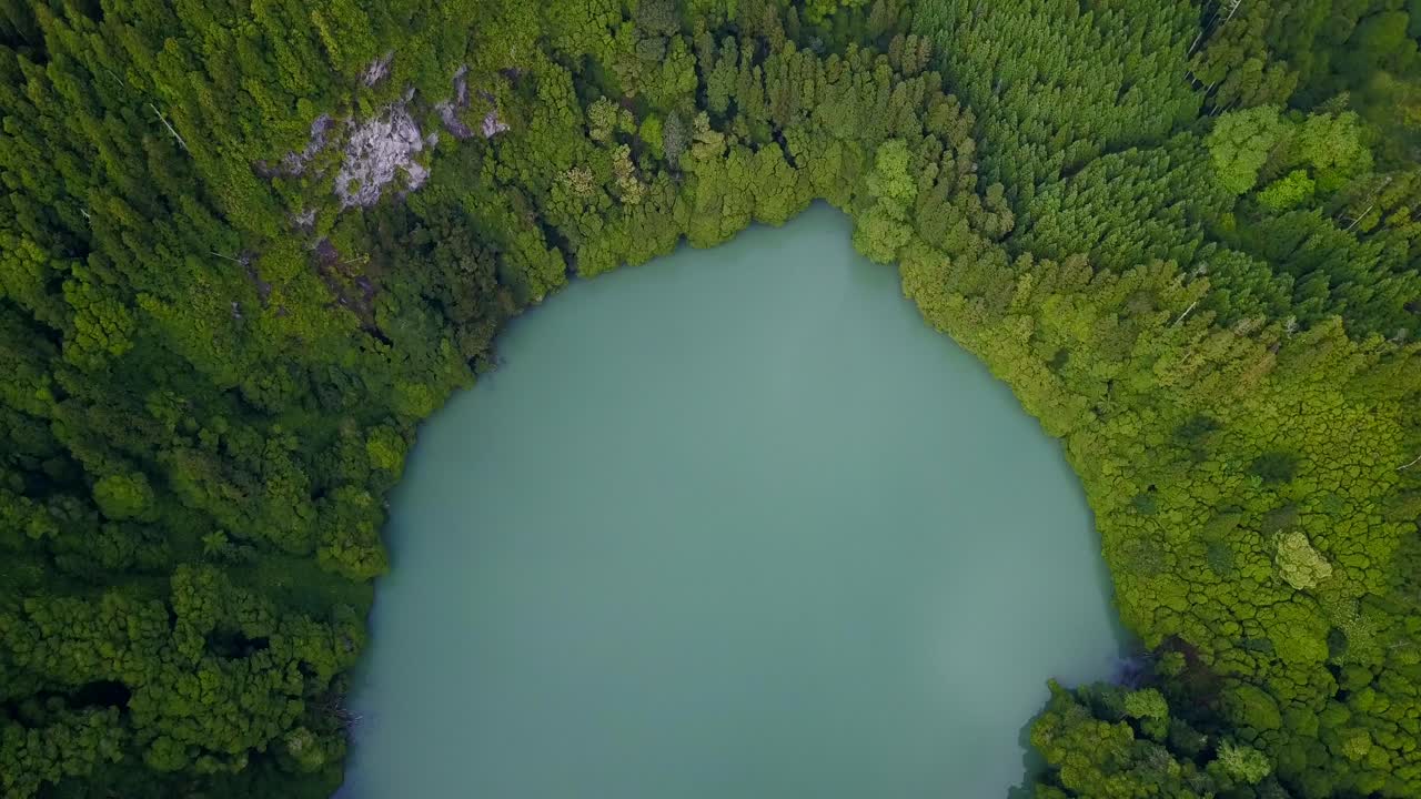 Lagoa do Congro bird eye vertical 4k drone view. High quality video of a lake in Azores islands