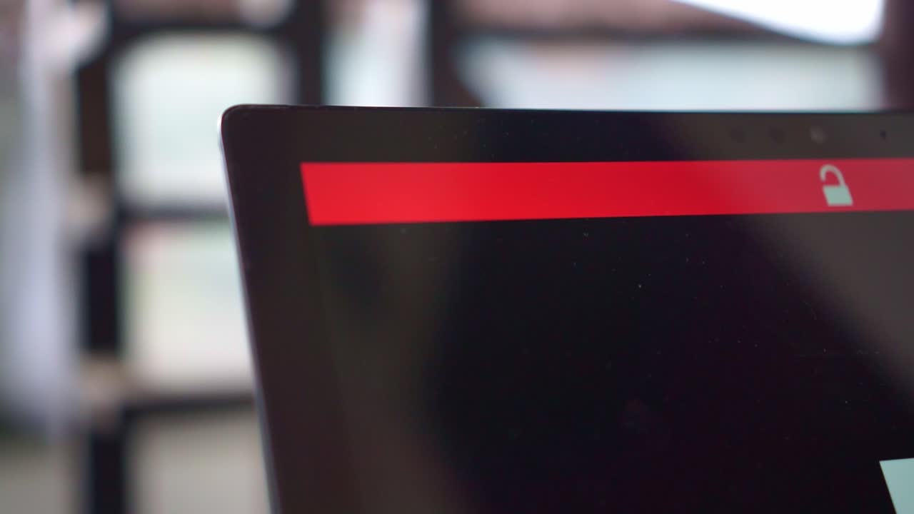 Finger pressing power button on tablet screen, close-up, turning on device, tech interaction, modern gadget use