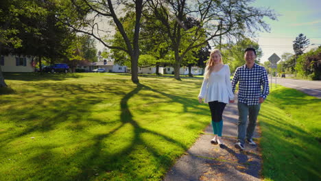 Couple-Walking-in-American-Suburb