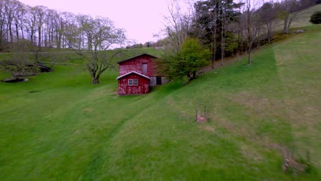 aerial fast pullout from barn near blowing rock and boone nc, north carolina