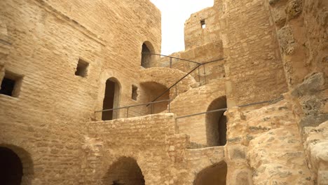 the ancient fortress of ribat in monastir, tunisia. old yellow bricks. view of the fortress from the bottom up