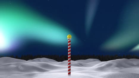 Animation-of-winter-scenery-with-north-pole-at-christmas-over-aurora