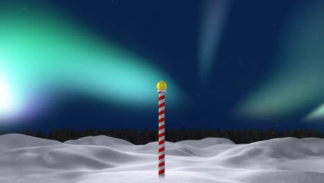 animation of winter scenery with north pole at christmas over aurora