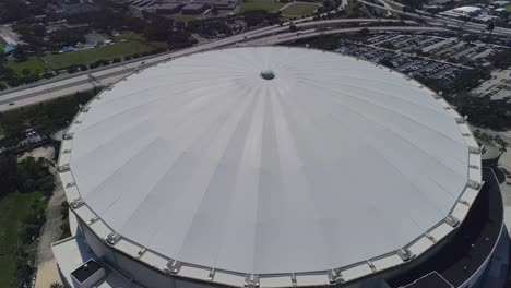 4k aerial drone video of domed roof of tropicana field in downtown st