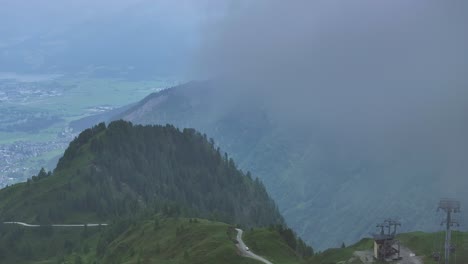 View-of-the-Austrian-Alps-and-ski-resort-of-Kitzsteinhorn-restricted-by-falling-fog