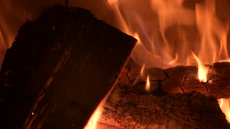 fire burning woods in rustic fireplace warming countryside house