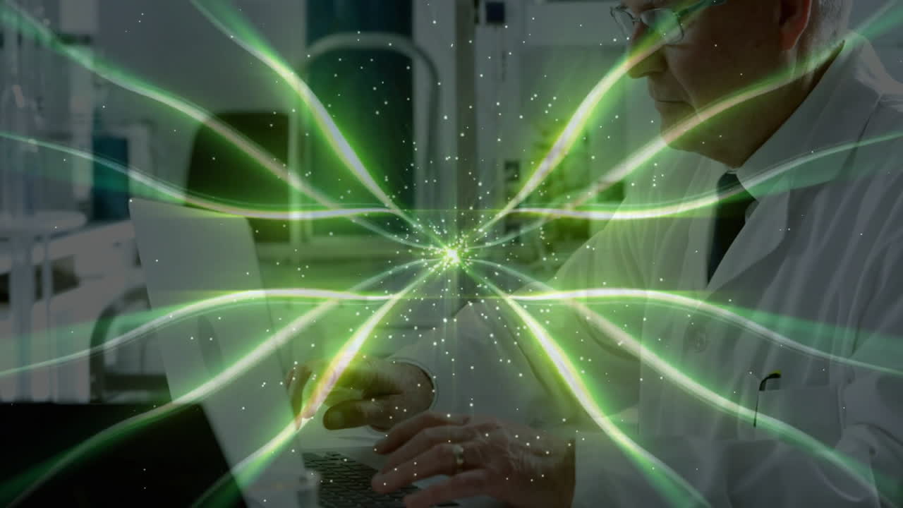 Scientist working on laptop with green energy animation overlaying scene