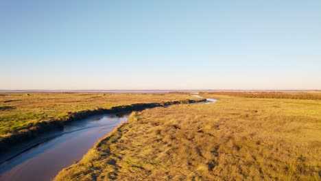 Spectacular-aerial-of-beautiful-marshland-curving-patterned-waterways-and-lagoons