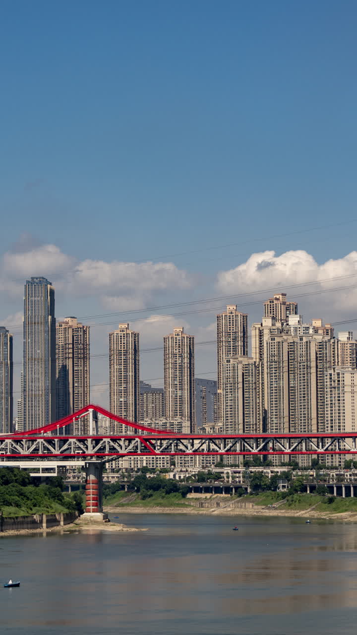 CHONGQING, CHINA - 18 MAY 2025 : Timelapse of the amazing Chongqing city skyline from a high vantage point in vertical