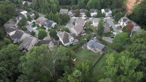 aerial orbits neighborhood, suburbs, american. small yards. houses