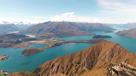 spectacular aerial views from the summit of roy's peak new zealand overlooking lake wanaka and stunning mountain peaks of the south island