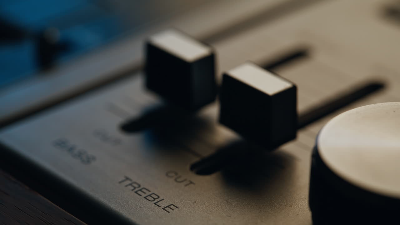 Macro faders vintage sound recorder in professional studio. Closeup sliders