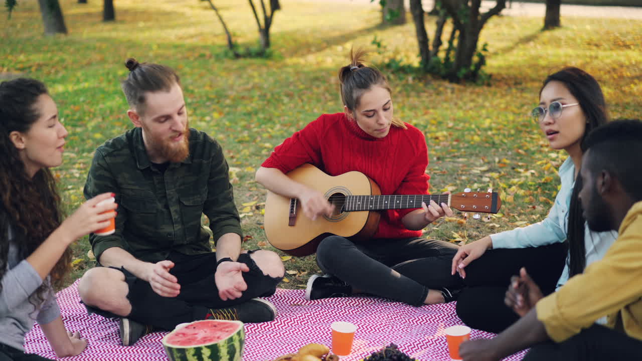 Friends enjoying a picnic in the park
