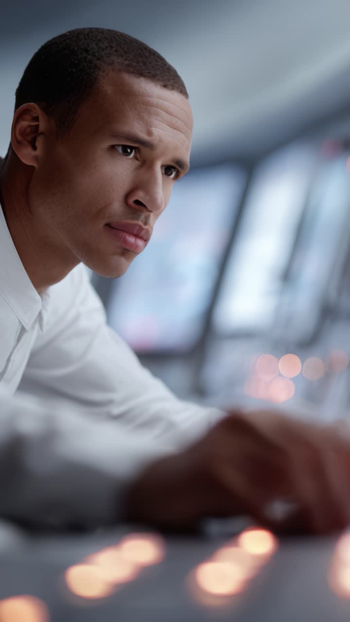 Focused Operator Analyzing Controls in a Modern Setting with Advanced Technology and a Professional Demeanor Enhancing Performance and Efficiency