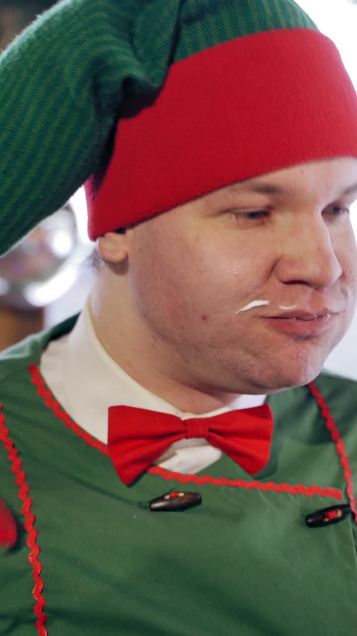 Portrait of eating elf. Vertical video
