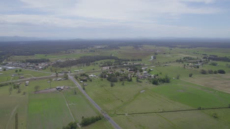 macleay valley way through green floodplains near kempsey in new south wales, australia