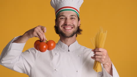 caucasian man in front of camera on yellow background.