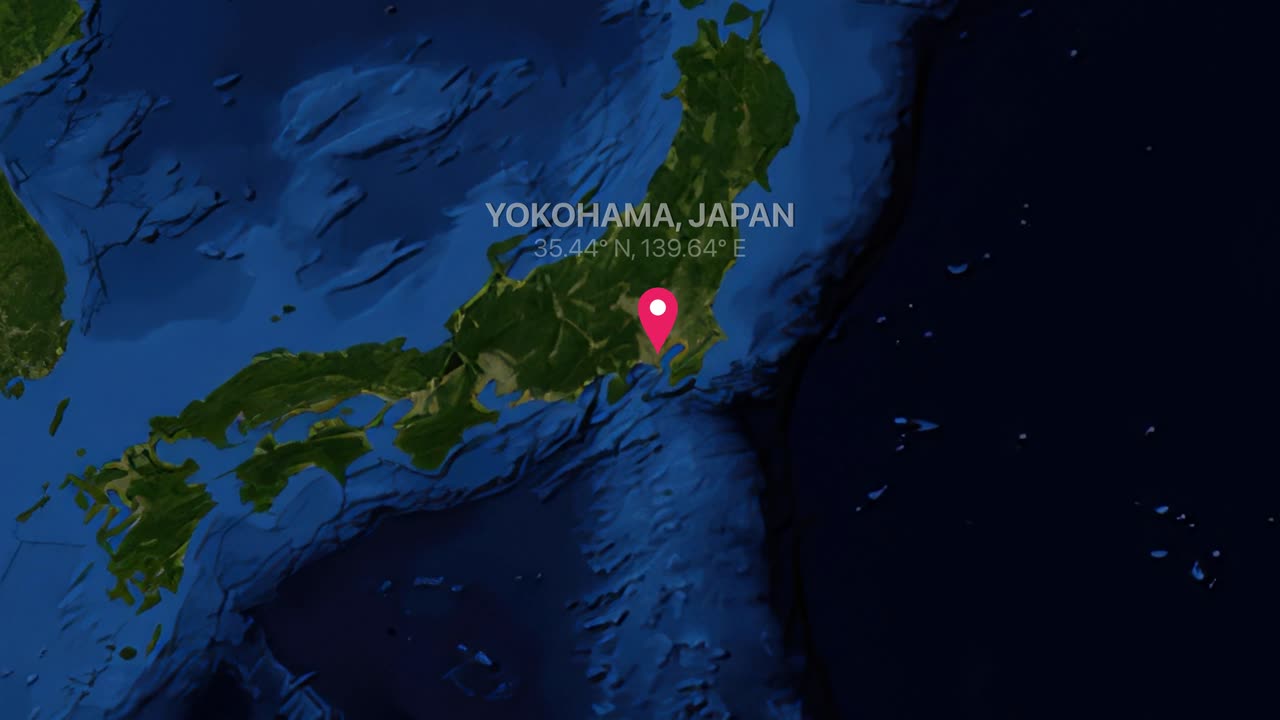 Satellite world map zooms into Japan, highlighting Yokohama with a red pin and coordinates