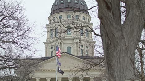 kansas state capitol building in topeka, kansas with dolly close up shot video moving right to left in slow motion