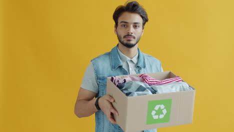 man donating clothes