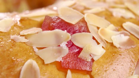 baked roscon de reyes with fruits and nuts. traditional kings day bread. epiphany cake. spanish rosca. macro