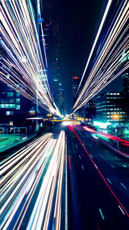 cityscape at night with light trails