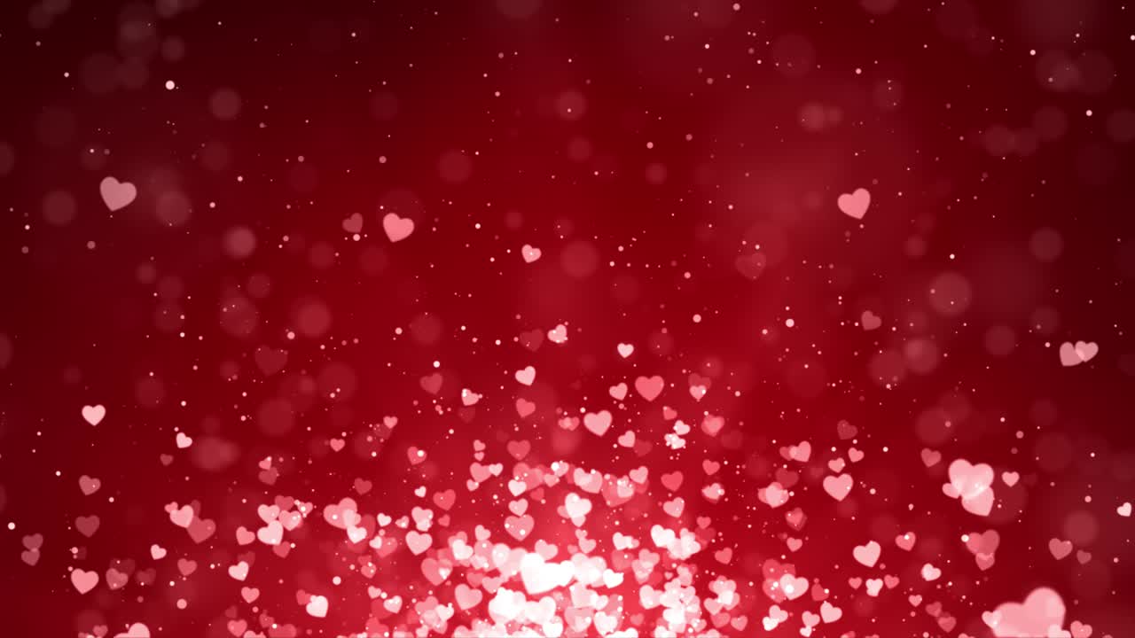 abstract forma de corazón brillante bokeh luces rojas partículas de brillo bucle animación de fondo.