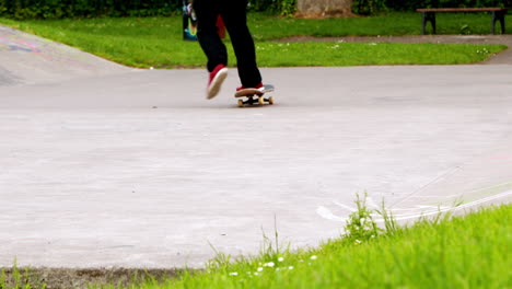 Young-skateboarder-skating-the-outdoor-skatepark