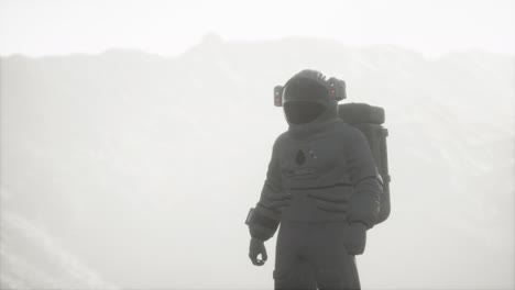 astronaut on another planet with dust and fog