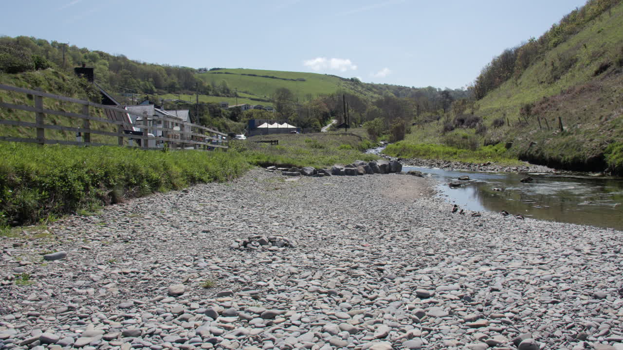 Extra wide shot looking up the Tydu river at Cwmtydu beach