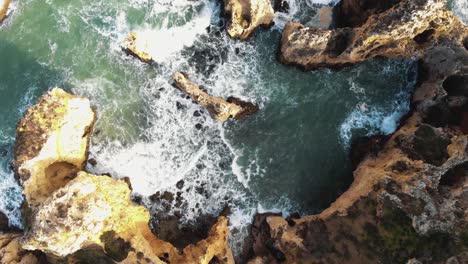 Top-view-of-Atlantic-Ocean-waves-crashing-on-cliffs