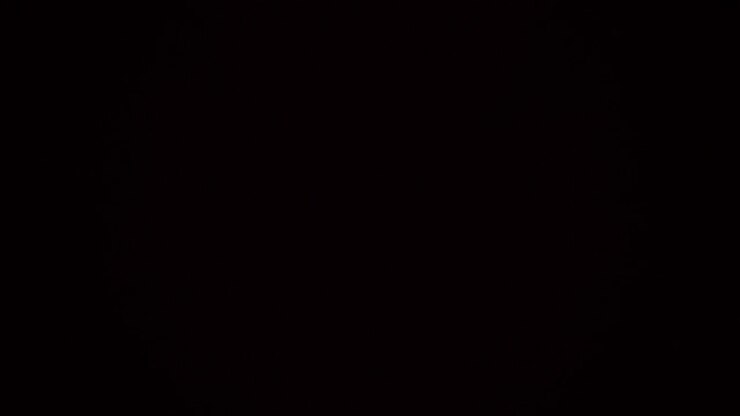 Video stock caleidoscopio con sovrapposizione di luce rossa