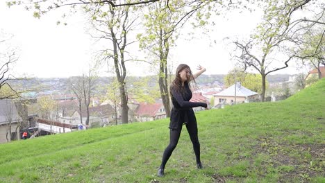 Dancer-performing-an-emotive-routine-in-a-tranquil-park