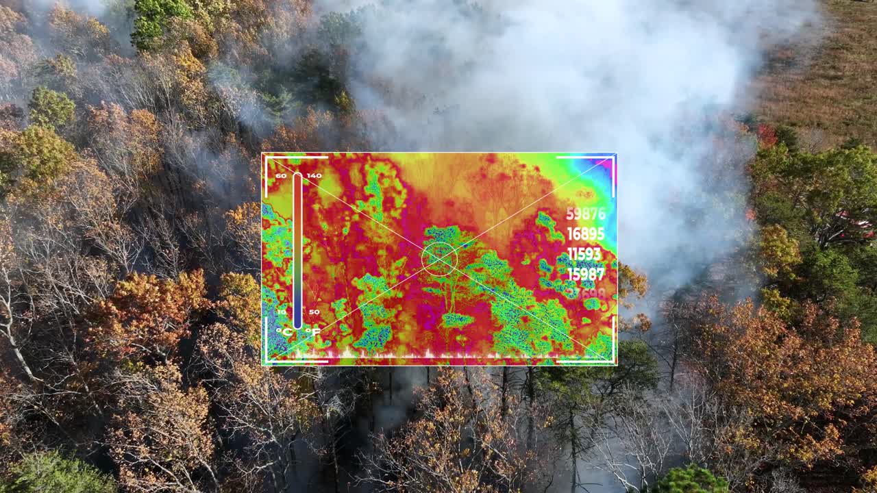 Active forest fire with rising smoke and an overlaid thermal heat-mapping interface animation of temperature zones and hotspots across the burning woodland during emergency response analysis