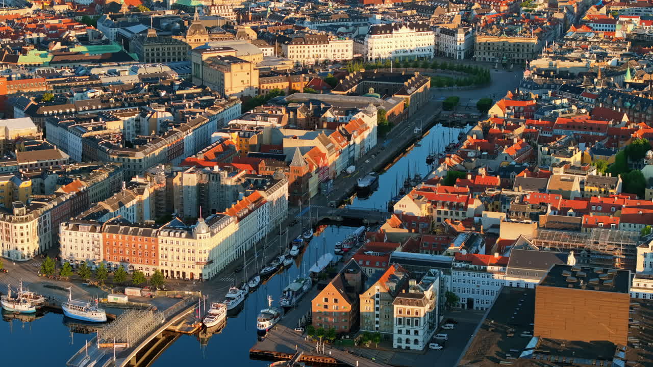 Aerial drone view of the city centre of the Copenhagen canals in Denmark at sunset