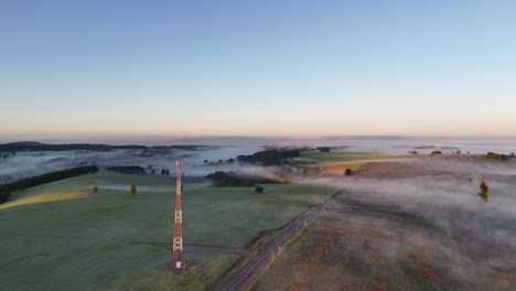aerial view over a chilean landscape waking up under a blanket of early morning dew