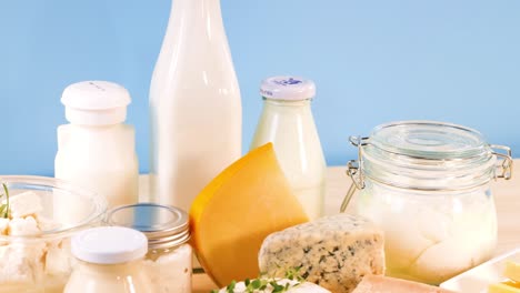 assorted dairy items displayed on wooden surface