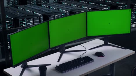 back view of tired asian man yawning while working with mock up multiple computer monitor in data center