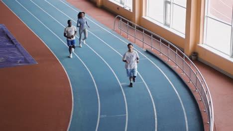 young people running indoors